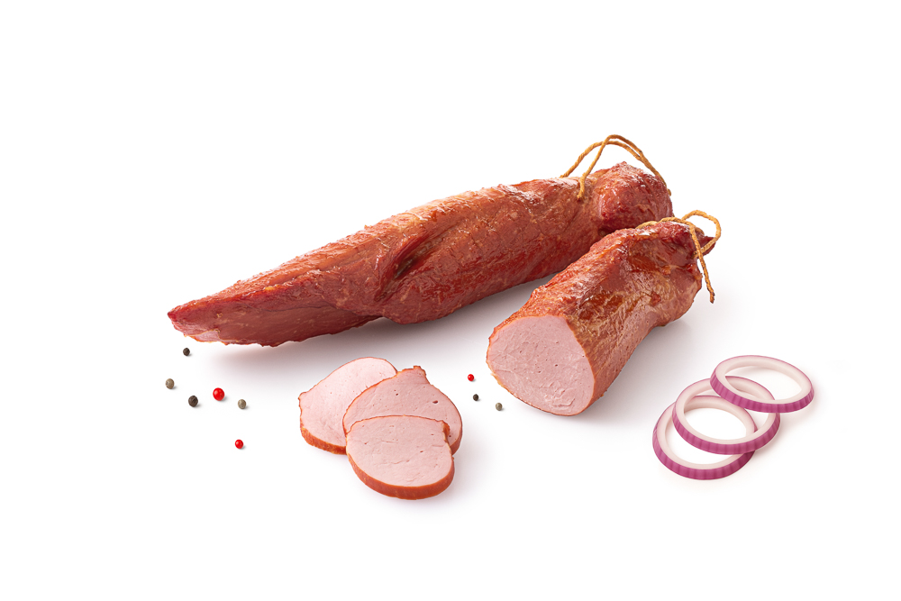 Polędwica wędzona w plastrach – fotografia kulinarna premium ukazująca soczystość mięsa.